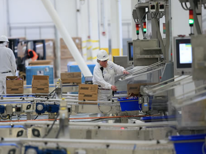 A Mars associate working in a warehouse