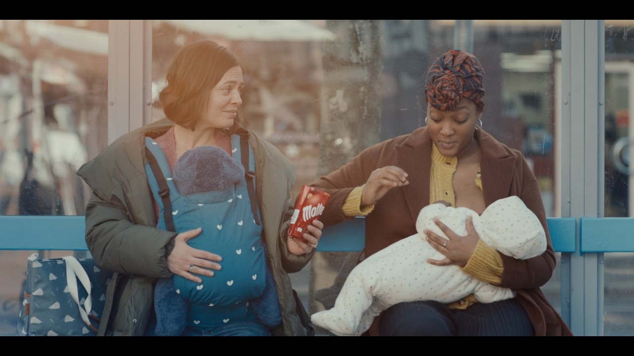 Two new mothers sharing Maltesers™