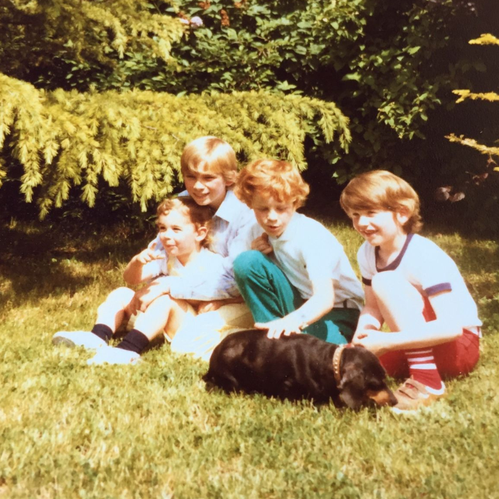 Loic Moutault as a young boy with his first dog, Pupuce