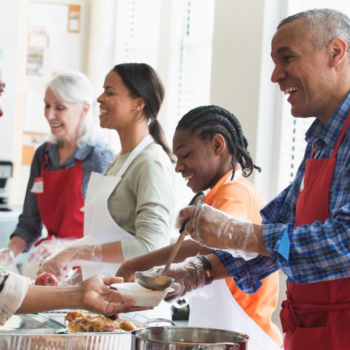 Volunteer serving food