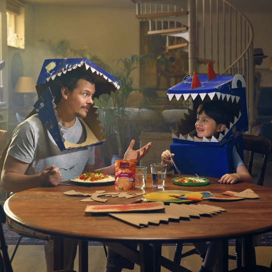 Father and son enjoying Ben's Original at the kitchen table