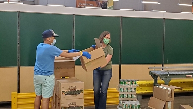 Capital Area Food Bank Workers in Washington, D.C. organize their donations.