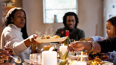 A family enjoying dinner together 