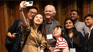 Michael W. Young poses for a selfie with other attendees of the Lindau Meeting