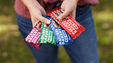 Woman holding chocolate bars