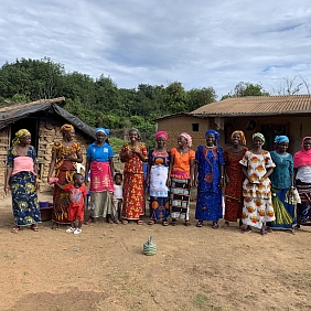 A group of women gathered in a Côte d’Ivoire village.