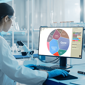 Woman scientist using a computer in a lab