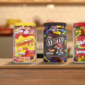 Recycled Starburst, M&M's and Skittles bulk packaging on a kitchen counter